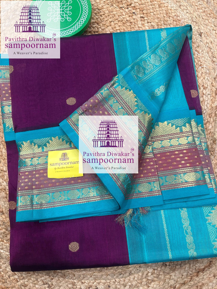 Purple with Blue ,rich Zari butta in the body, traditional borders and rich  , rich Zari butta in the body and Kanchi traditional borders and rich Pallu Korvai Silk Cotton Sare