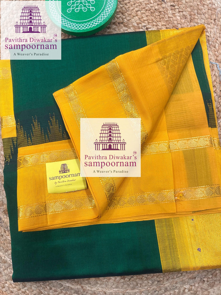 Dark Green with Manjal , temple rettapet border , grand Pallu Korvai Silk Cotton Saree