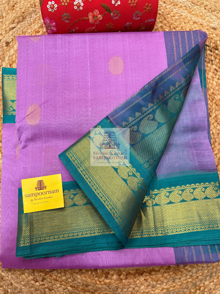Lavender with Turquoise Blue , traditional border with Rich Zari butta in the body and Grand Pallu Korvai Silk Cotton Saree