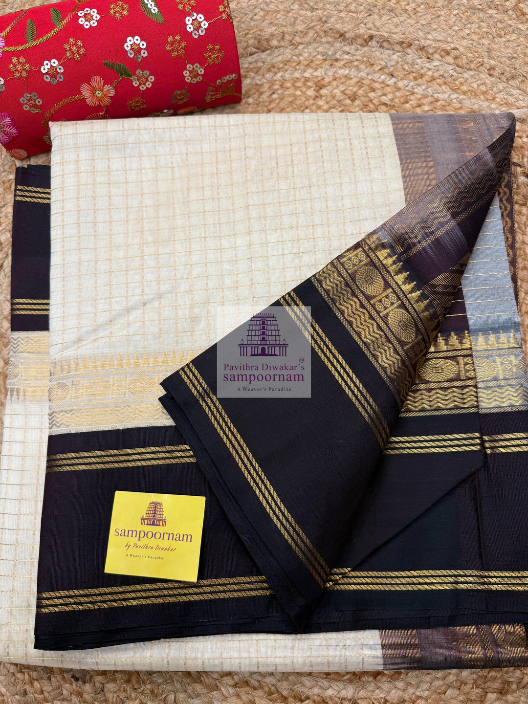 Offwhite with Dark Brown , Zari checks in the body , rich borders with traditional Pallu Korvai Silk Cotton Saree