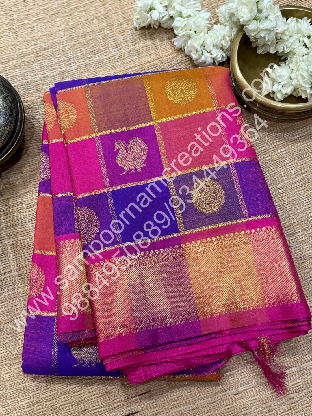 Pink , Purple , Mustard , Orange with Pink , Rich Mayil and Chakram  butta in the body with Zari checks , Traditional borders and Rich Pallu , Pure Kanjivaram Silk Saree