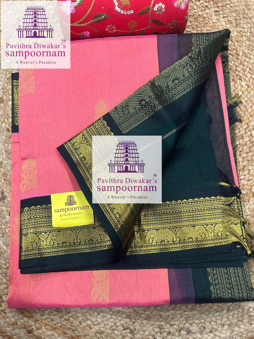Peachish Pink with Dark Green , rich Zari butta in the body ,traditional boders and rich Pallu Korvai Silk Cotton Saree