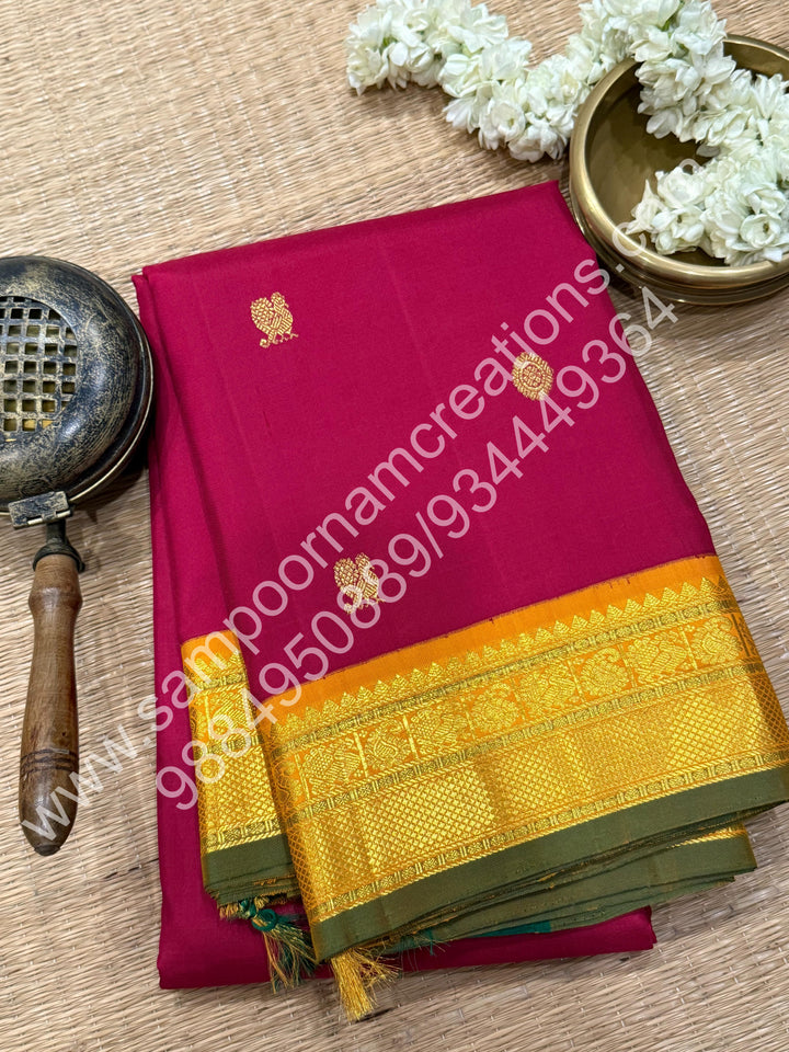 Kumkum Red with Mustard , Rich Mayil and Chakram  butta in the body , Traditional borders and Rich Pallu , Pure Kanjivaram Silk Saree
