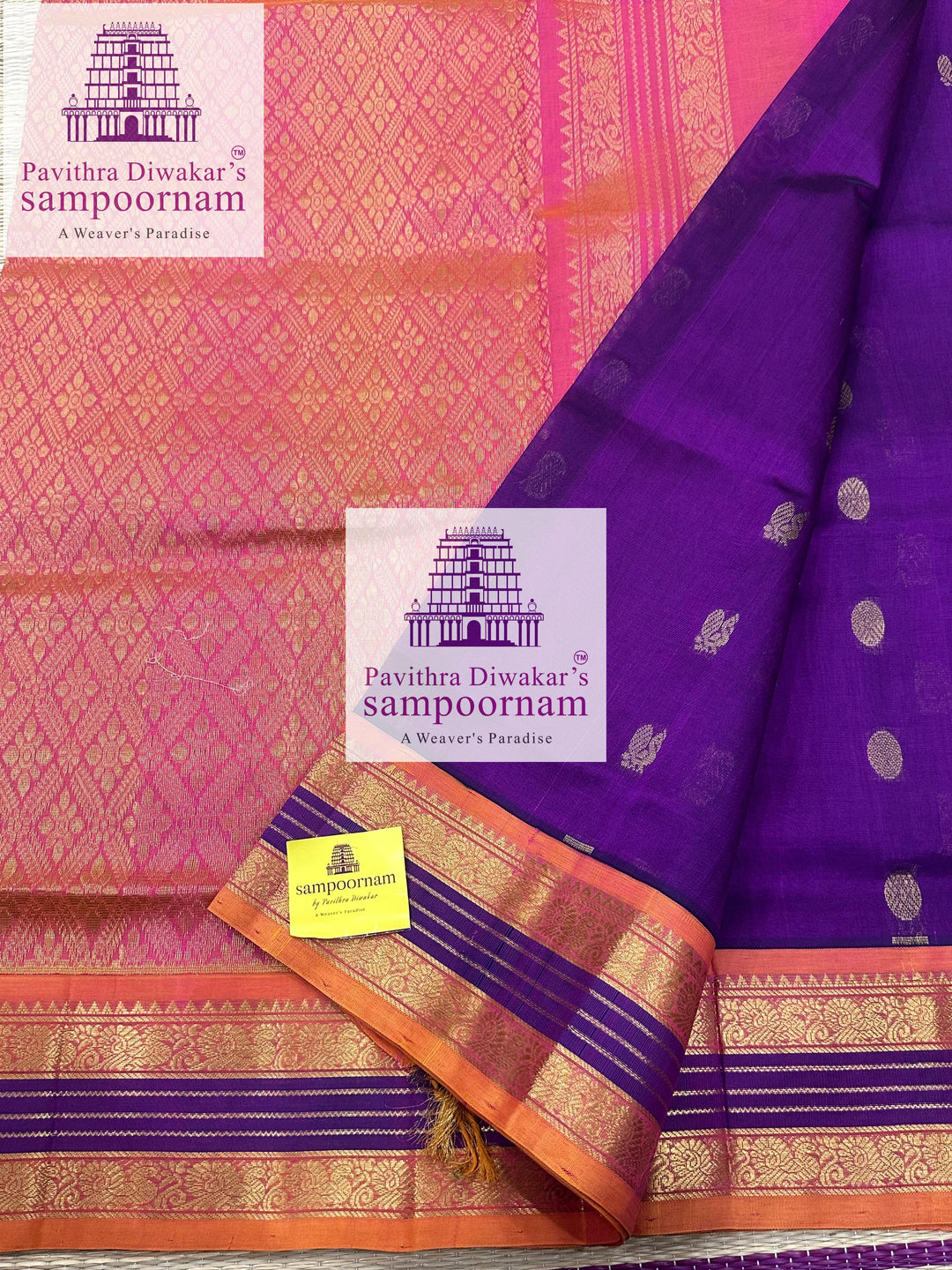 Purple with Peachish Pink , rich Zari butta in the body and Kanchi traditional borders and rich Pallu Korvai Silk Cotton Saree