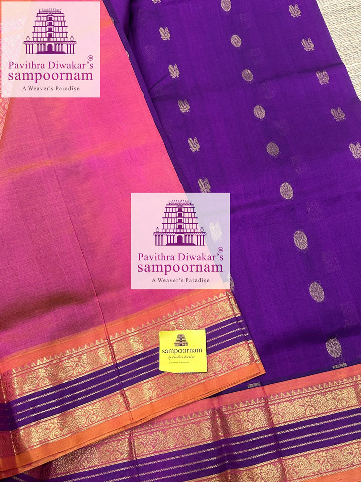 Purple with Peachish Pink , rich Zari butta in the body and Kanchi traditional borders and rich Pallu Korvai Silk Cotton Saree