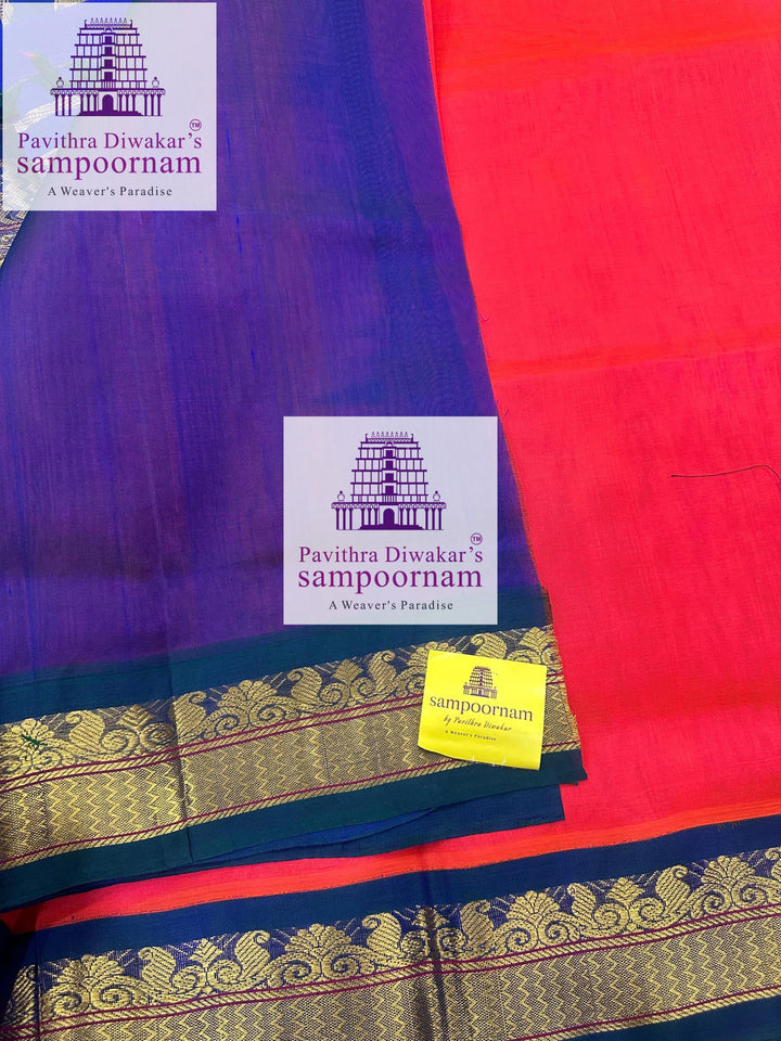 Dark Orangish Pink with Mayilkazhuthu , rich Zari butta in the body , traditional borders and rich Pallu Korvai Silk Cotton Saree