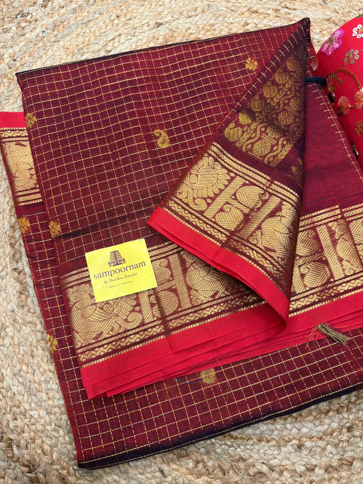 Dark Maroon with Red Selvedge,Podi Zari Kattam in the Body, Rich Butta, Traditional Borders and Rich Pallu Semi Silk Cotton Saree