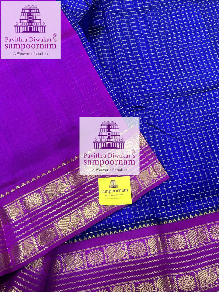Blue with Purple , Zari checks in the body , traditional rettapet border and rich Pallu Korvai Silk Cotton Saree