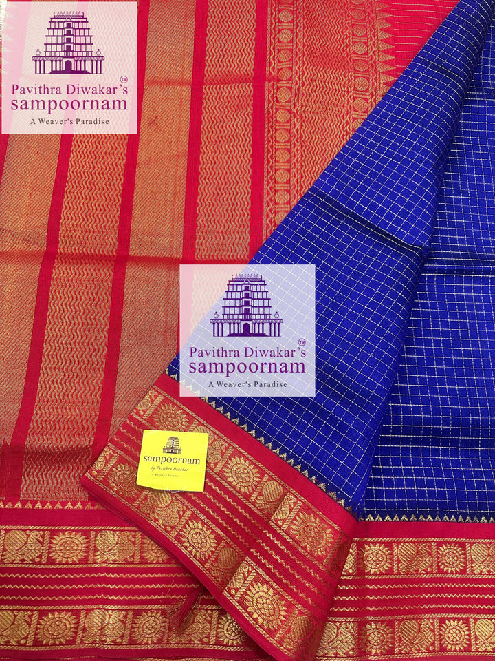 Blue with Red , Zari checks in the body , traditional rettapet border and rich Pallu Korvai Silk Cotton Saree
