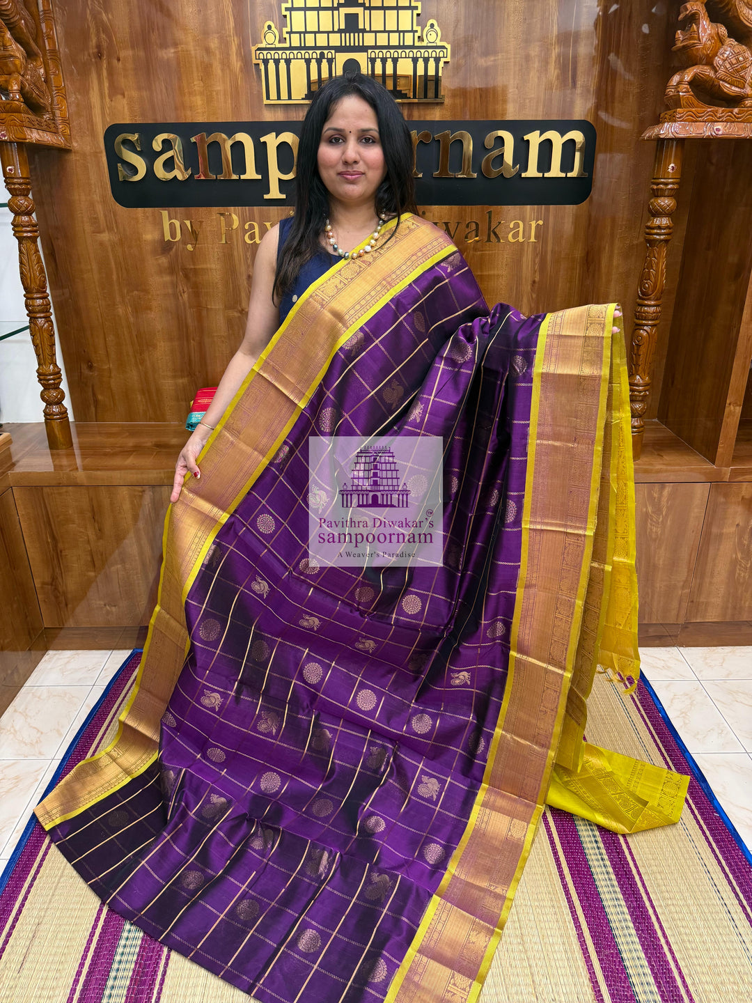 Purple with Lemon Yellow , , rich Zari checks in the body , Mayil and Chakram rich Zari butta in the body , traditional borders and rich Pallu Silk Cotton Saree