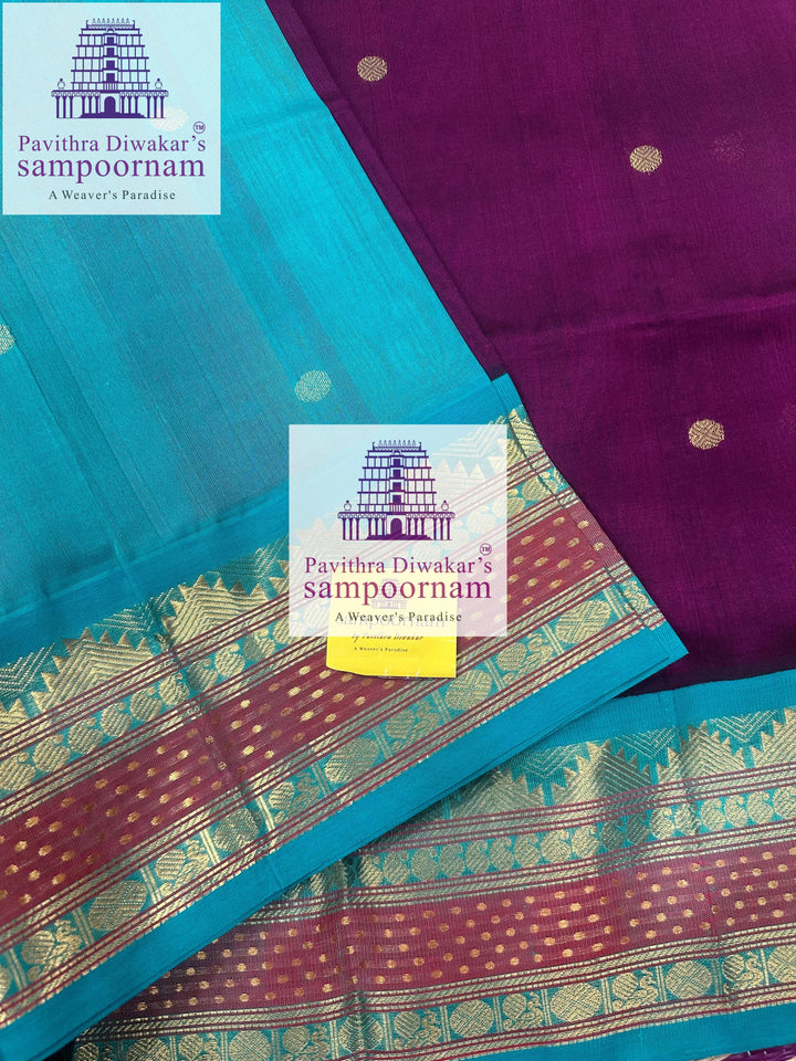 Purple with Blue ,rich Zari butta in the body, traditional borders and rich  , rich Zari butta in the body and Kanchi traditional borders and rich Pallu Korvai Silk Cotton Sare