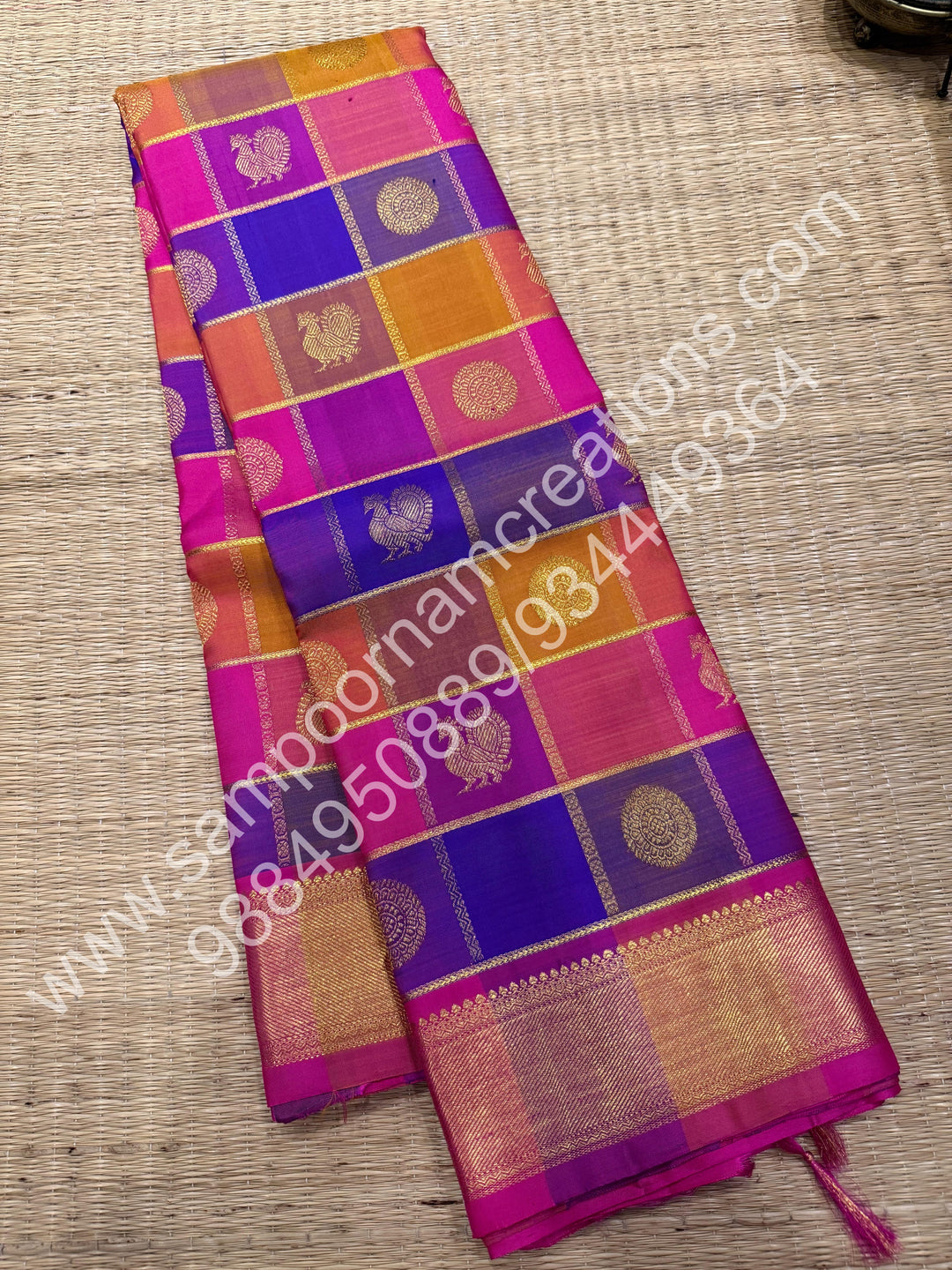 Pink , Purple , Mustard , Orange with Pink , Rich Mayil and Chakram  butta in the body with Zari checks , Traditional borders and Rich Pallu , Pure Kanjivaram Silk Saree