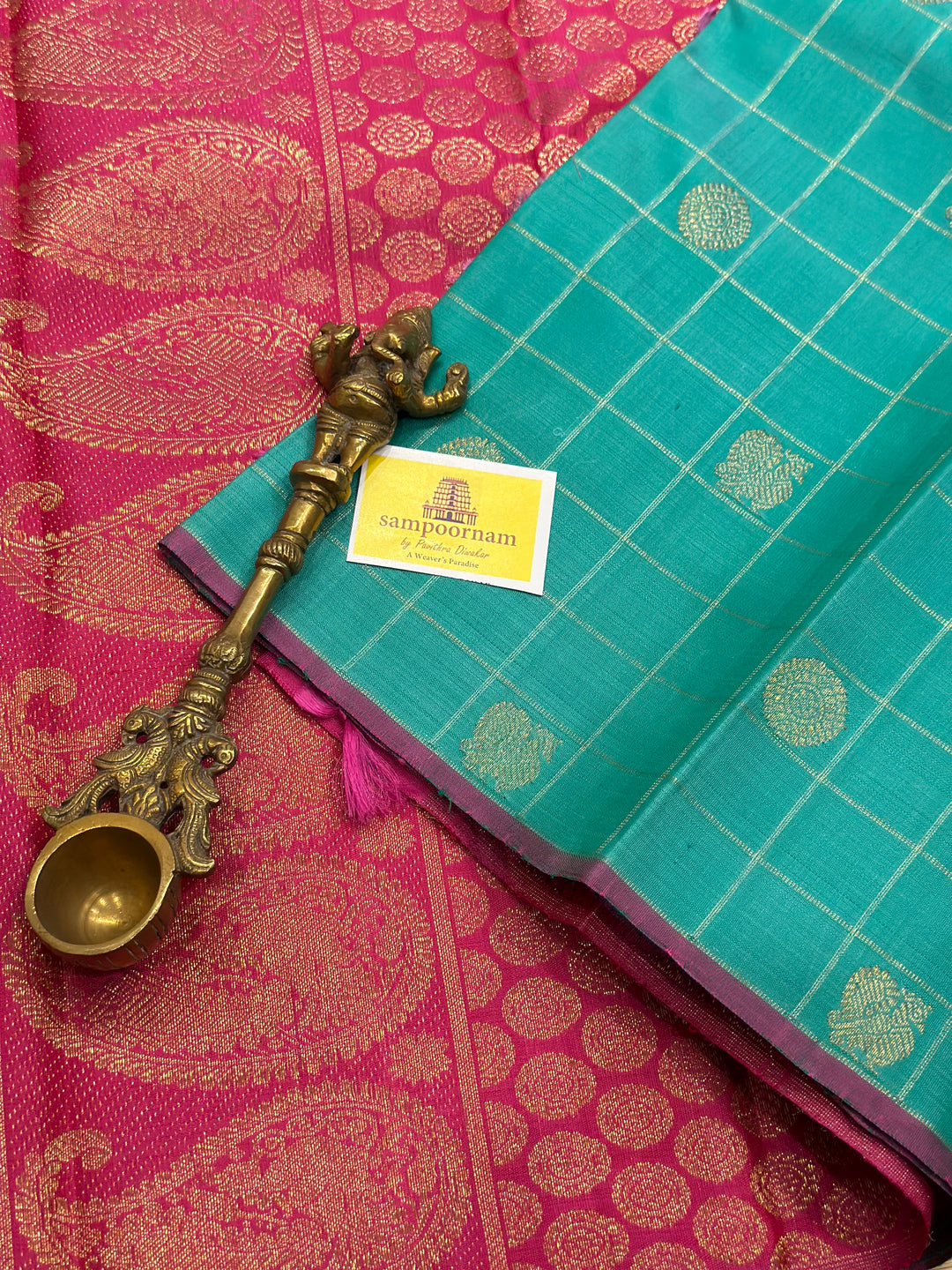 Sea Green with Pink Borderless Body Zari Checks with Mayil Chakram Butta and Rich Pallu- Pure silk Pure Zari Kanjivaram Silk Saree