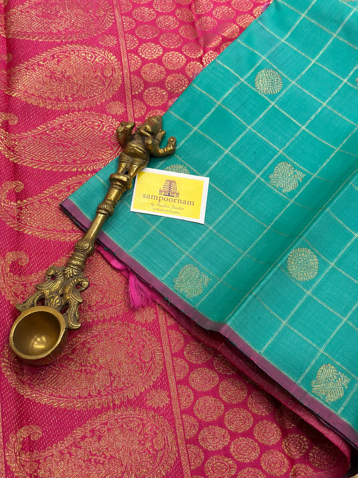 Sea Green with Pink Borderless Body Zari Checks with Mayil Chakram Butta and Rich Pallu- Pure silk Pure Zari Kanjivaram Silk Saree