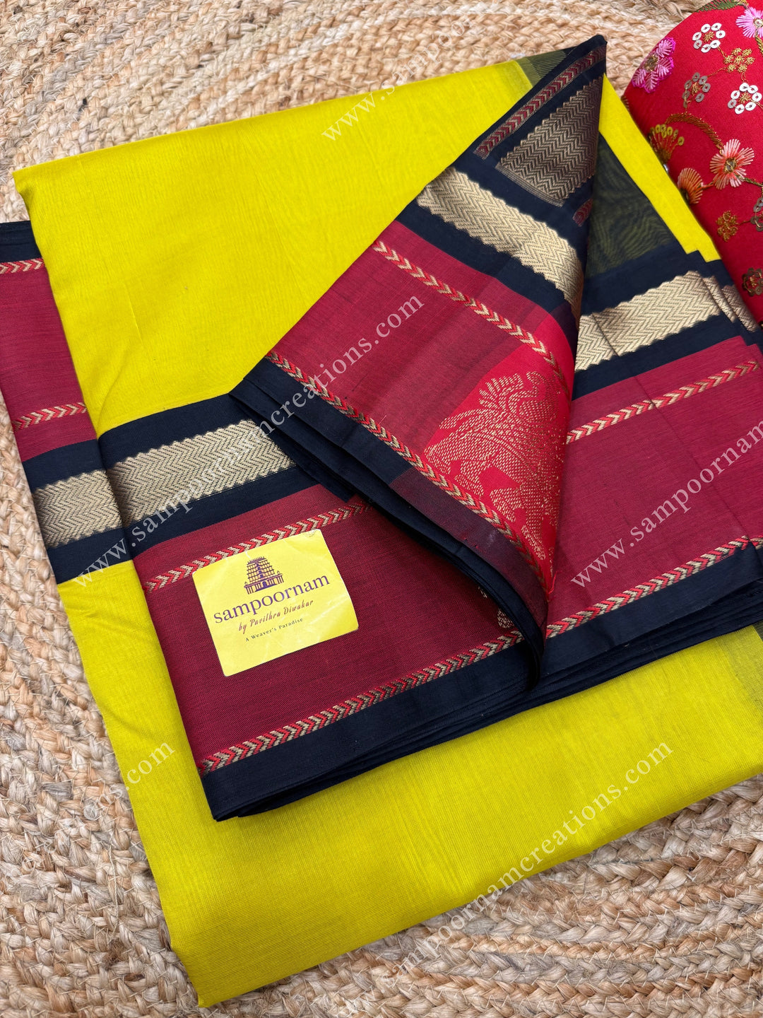 Lemon Yellow with Black  ,  Elephant motifs in the borders and  Traditional  Pallu Korvai Silk Cotton Saree
