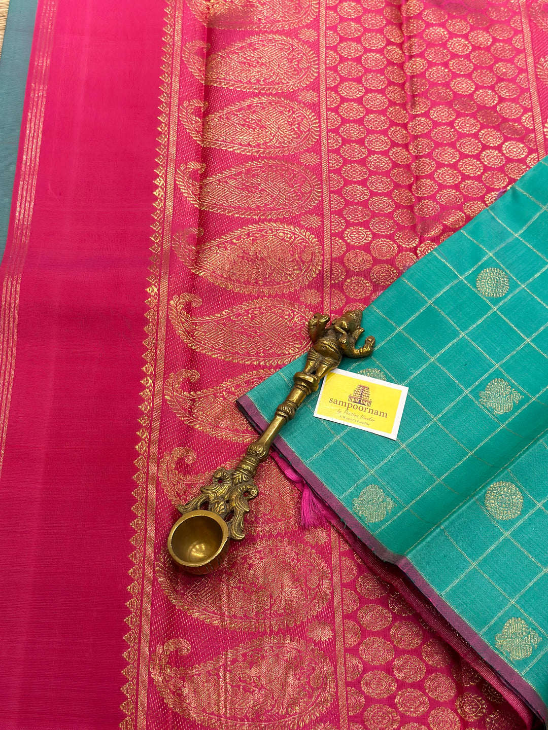 Sea Green with Pink Borderless Body Zari Checks with Mayil Chakram Butta and Rich Pallu- Pure silk Pure Zari Kanjivaram Silk Saree