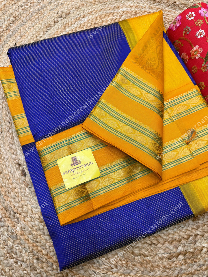 MS Blue with Yellow , Rich Zari Podi Kattam in the body and rettapet borders ,  grand Pallu Korvai Silk Cotton Saree
