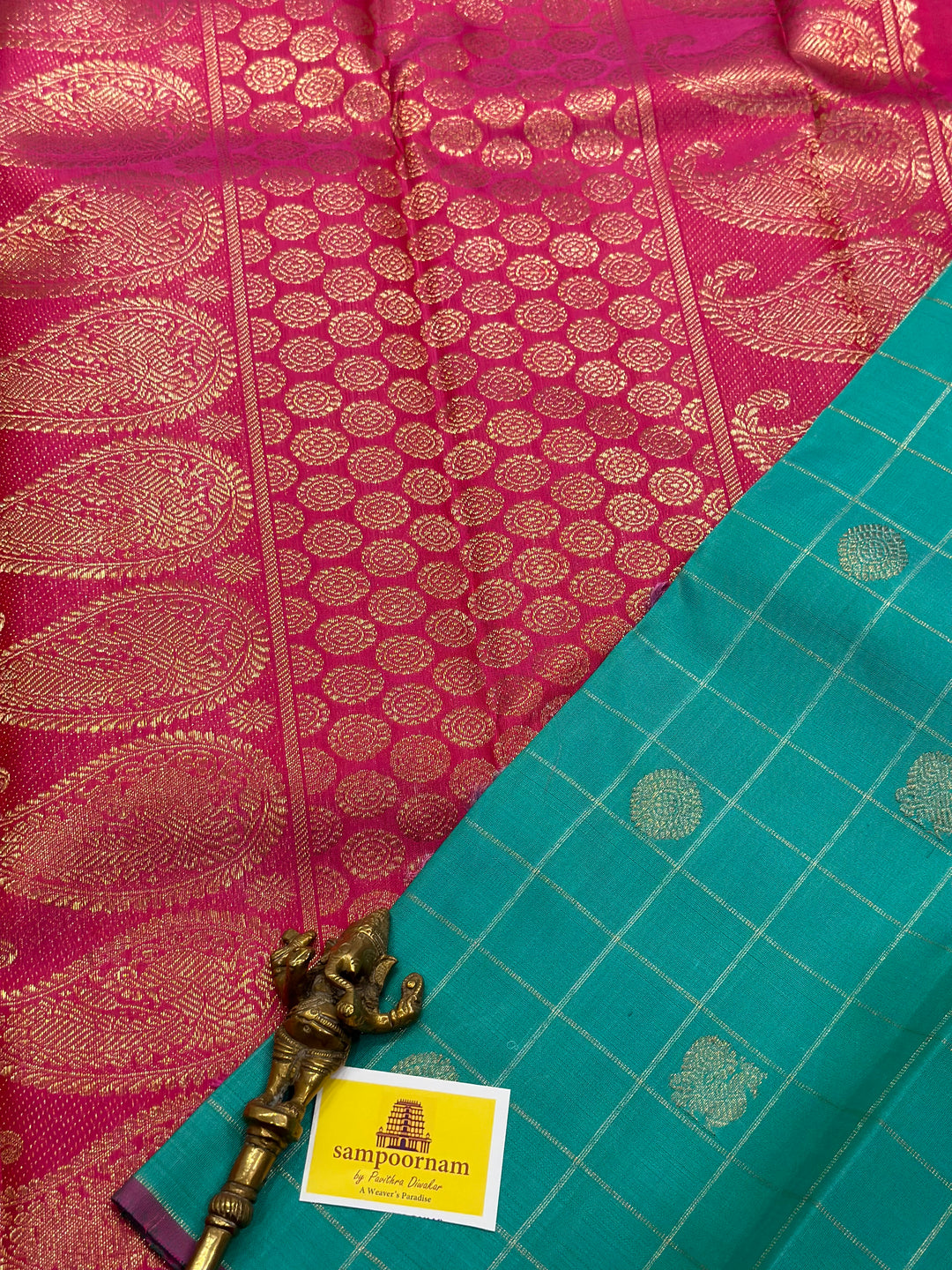 Sea Green with Pink Borderless Body Zari Checks with Mayil Chakram Butta and Rich Pallu- Pure silk Pure Zari Kanjivaram Silk Saree