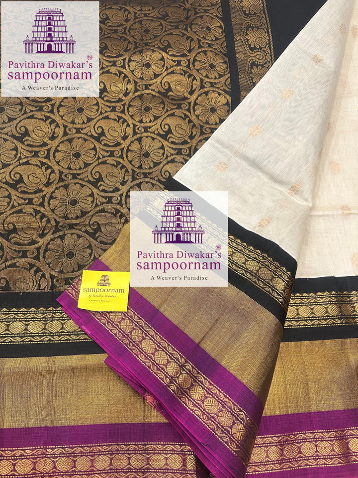 White with Black , triple one side big border , rich butta in the body and grand Pallu Korvai Silk Cotton Saree