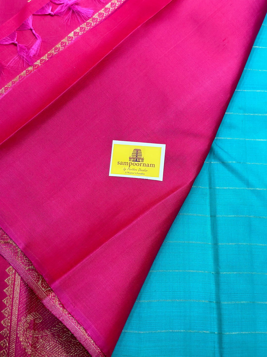 Sea Green with Pink Borderless Body Zari Checks with Mayil Chakram Butta and Rich Pallu- Pure silk Pure Zari Kanjivaram Silk Saree