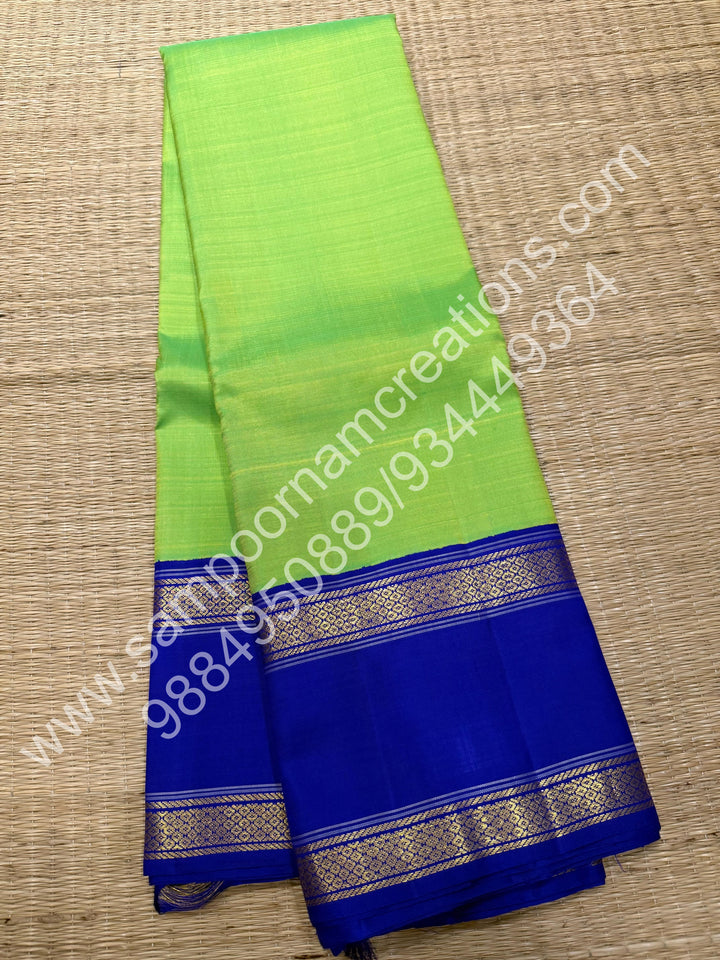 Parrot Green with Blue , rettapet  borders and Rich Pallu  Pure Kanjivaram Silk Saree
