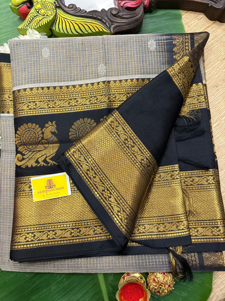 Grey with Black zari podi kattam in the body,satin border with annam motif, rich border and pallu korvai silk  cotton saree