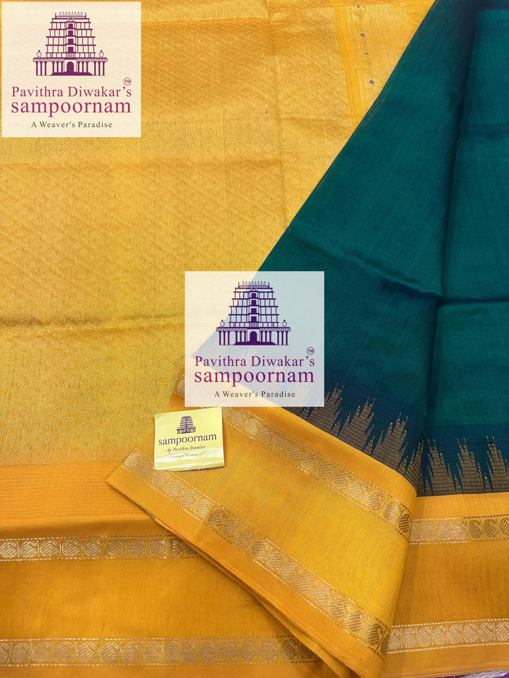 Dark Green with Manjal , temple rettapet border , grand Pallu Korvai Silk Cotton Saree
