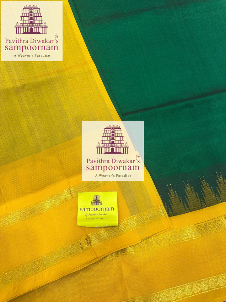 Dark Green with Manjal , temple rettapet border , grand Pallu Korvai Silk Cotton Saree