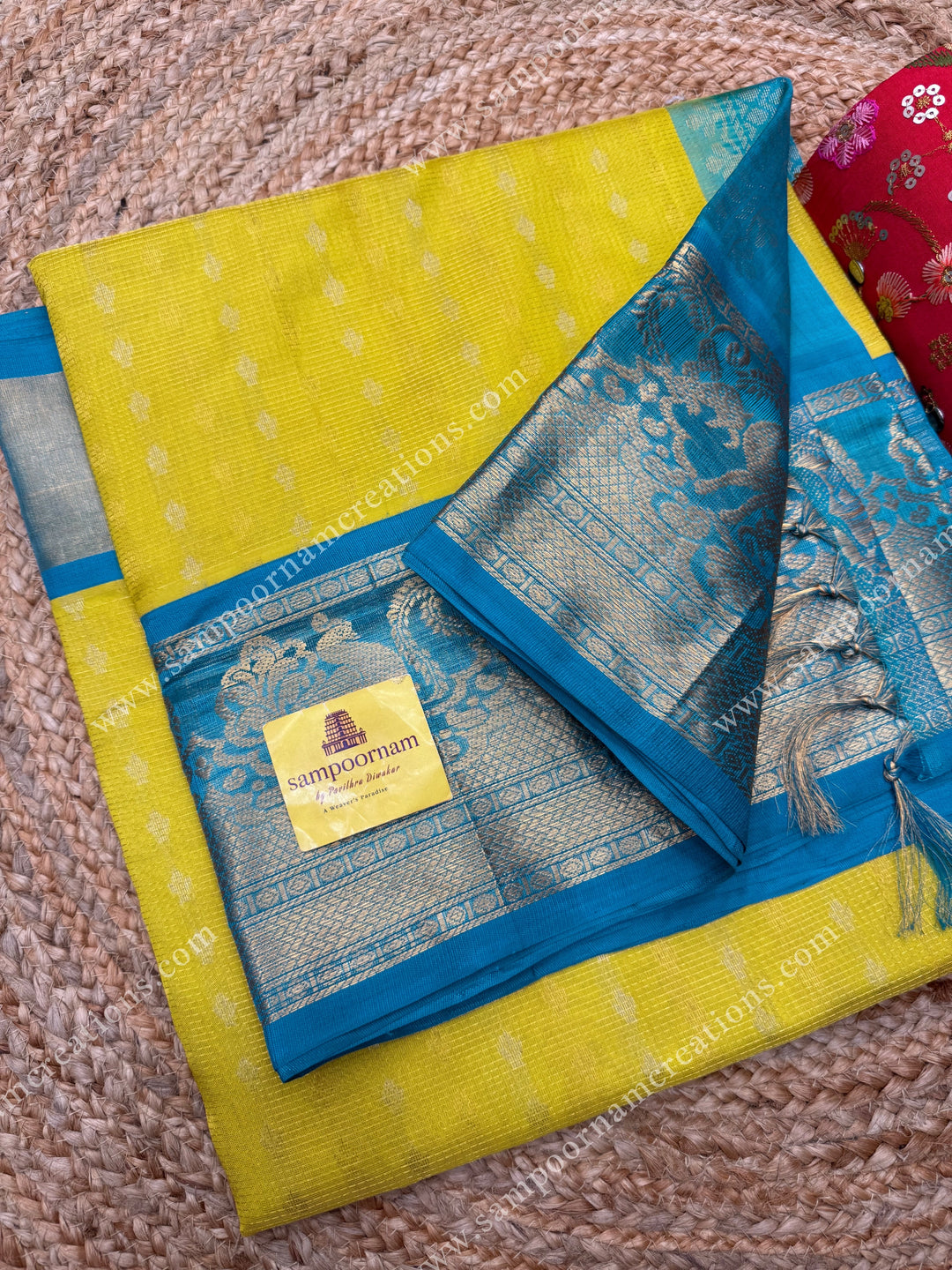 Lemon Yellow with Turquoise Blue ,  Rich Zari butta and Podi Kattam in the body , traditional One side long border , grand Pallu Korvai Silk Cotton Saree