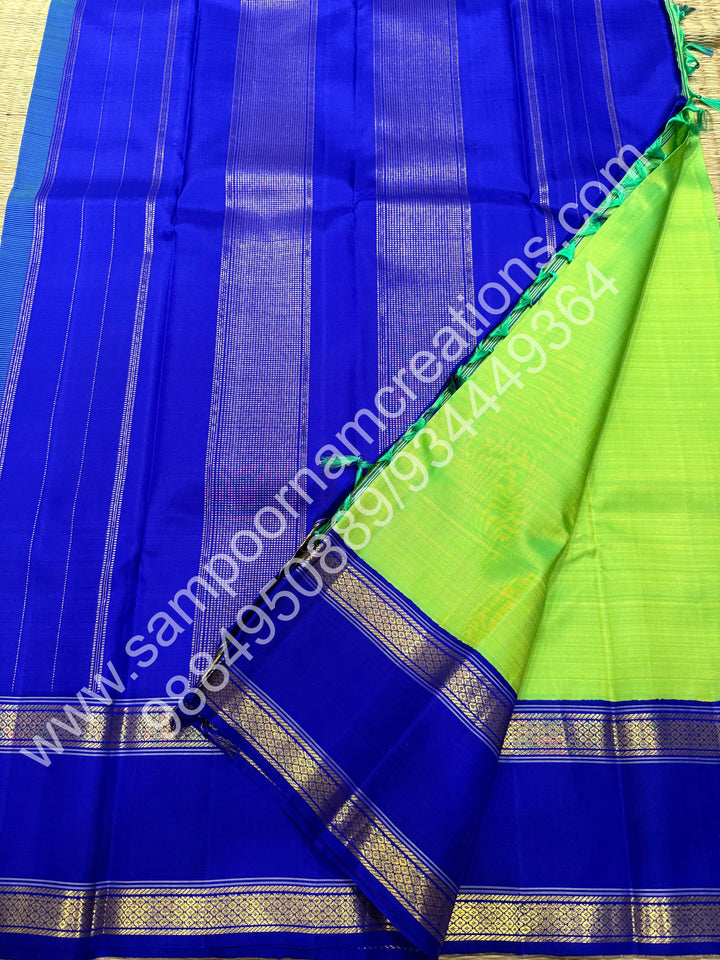 Parrot Green with Blue , rettapet  borders and Rich Pallu  Pure Kanjivaram Silk Saree