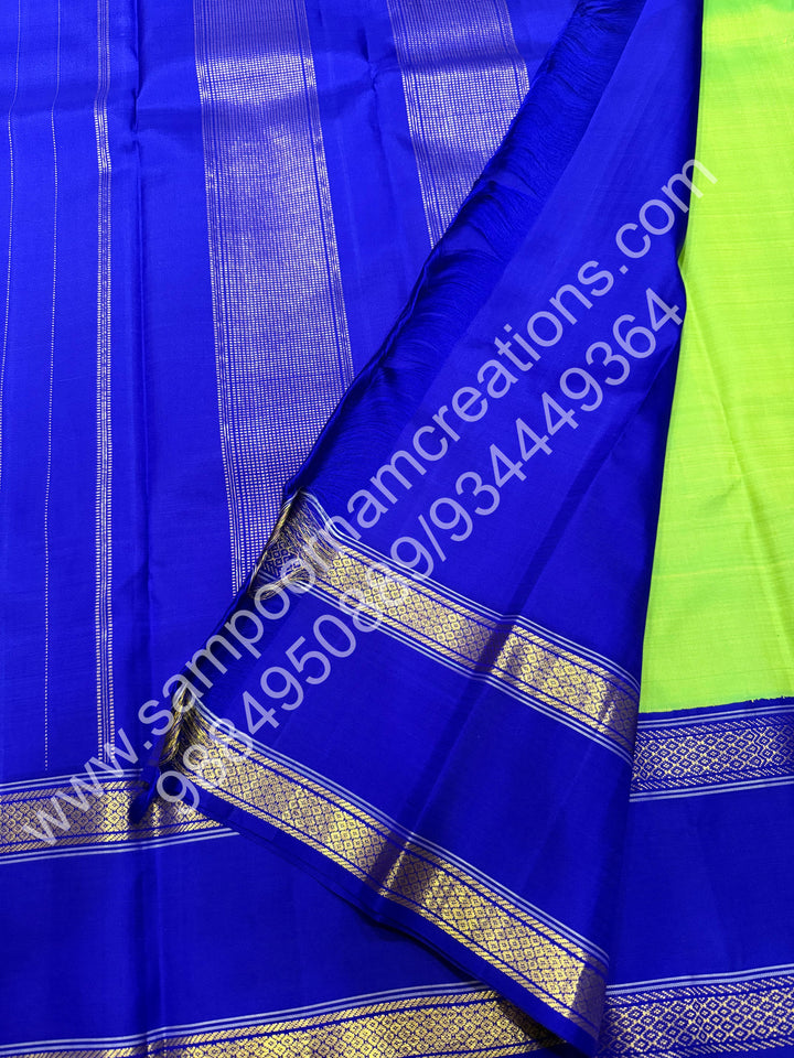 Parrot Green with Blue , rettapet  borders and Rich Pallu  Pure Kanjivaram Silk Saree