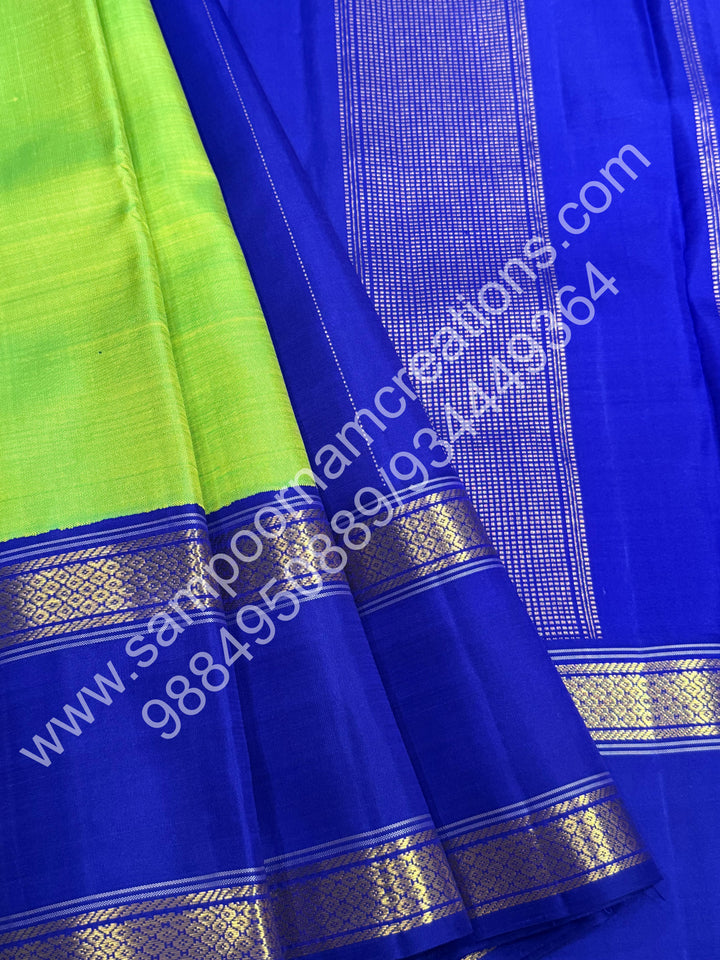 Parrot Green with Blue , rettapet  borders and Rich Pallu  Pure Kanjivaram Silk Saree