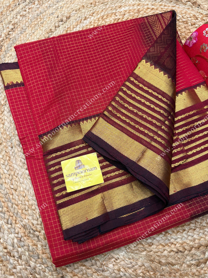 Red with Arakku , Zari checks in the body and One side long veldhari borders , rich Pallu Silk Cotton Saree