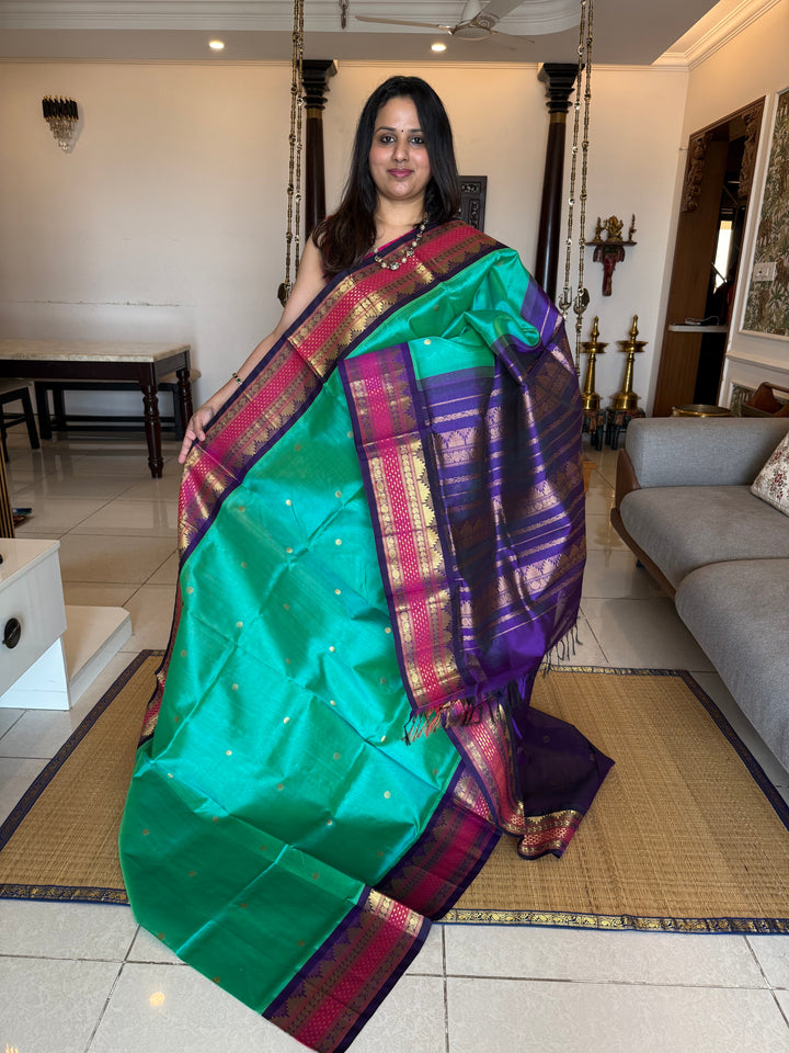 Ramar Blue with Blue , Lakshadeepam rich kanchi border , rich Zari butta in the body , traditional Pallu , Korvai Silk Cotton Saree