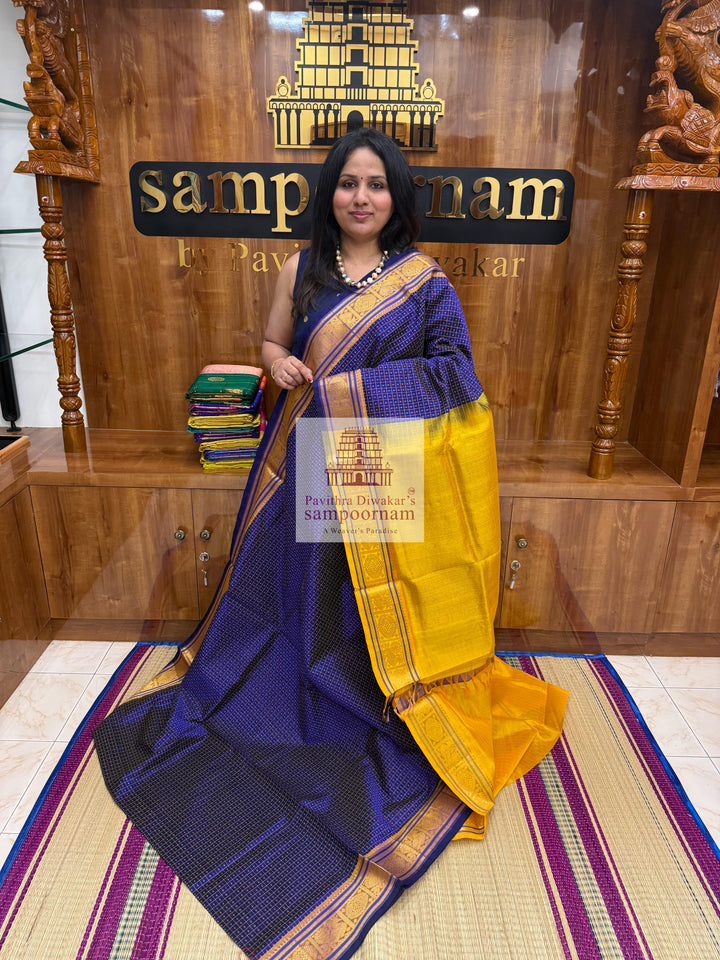 Blue with yellow , Lakshadeepam butta in the body , traditional borders and rich Pallu Lakshadeepam Silk Cotton Saree