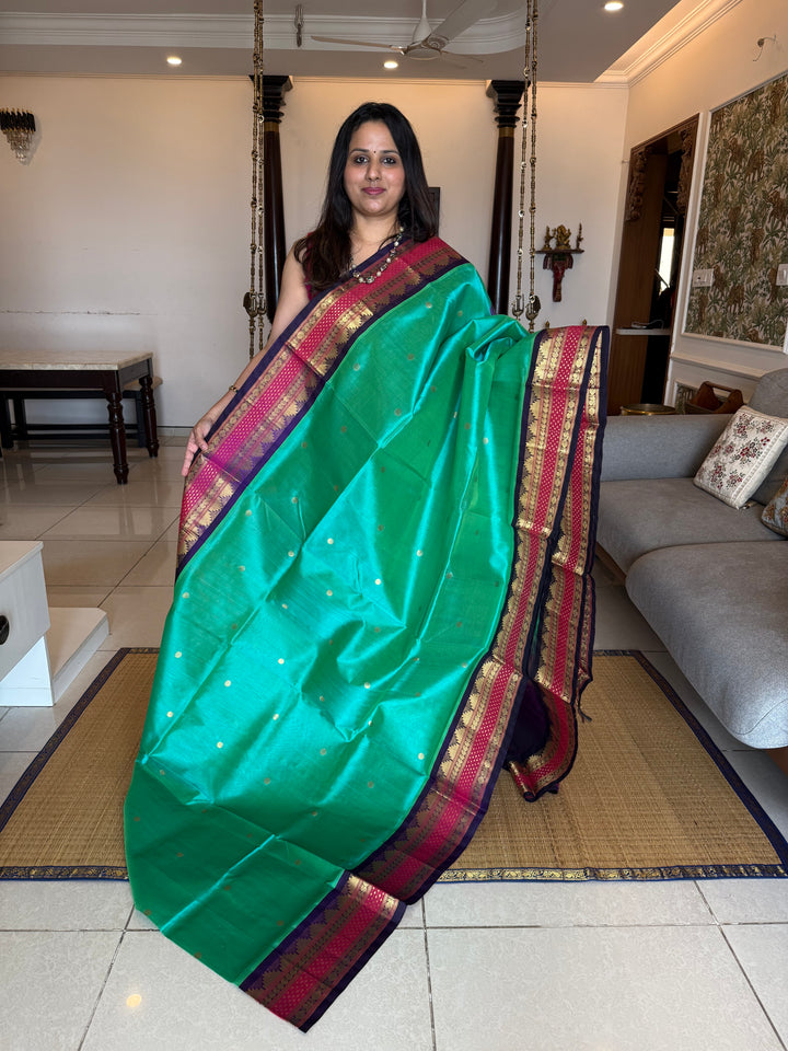 Ramar Blue with Blue , Lakshadeepam rich kanchi border , rich Zari butta in the body , traditional Pallu , Korvai Silk Cotton Saree