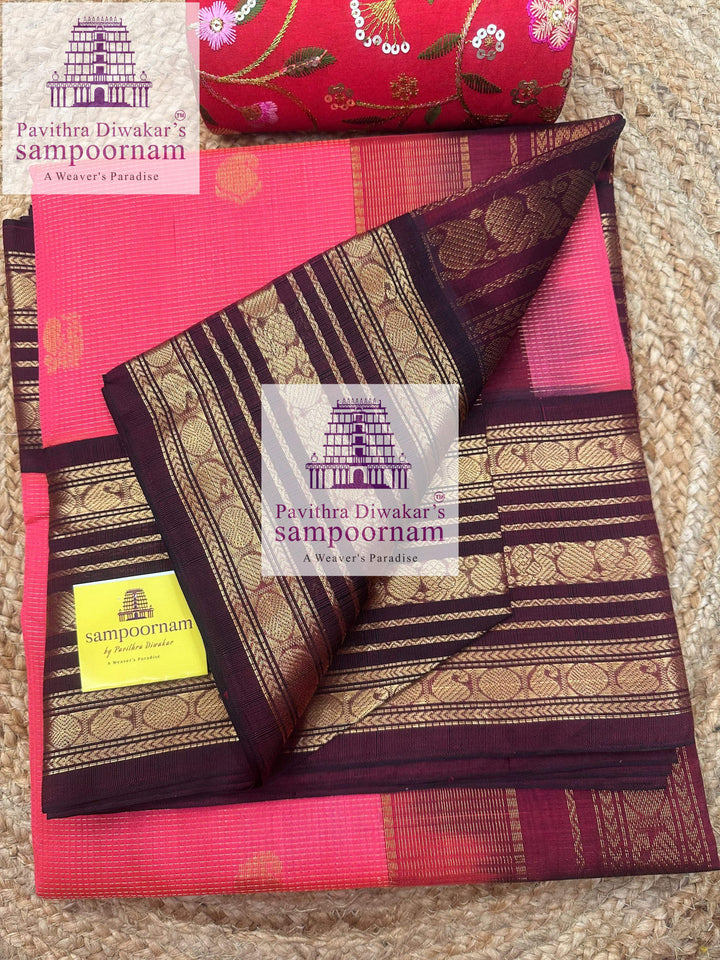 Lotus Pink with Dark Araku , Podi Kattam with butta in the body , Kanchi borders and rich Pallu Korvai Silk Cotton Saree
