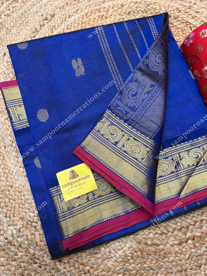 Indigo Blue , Red Selvedge  , Zari butta in the body with  Vairaoosi Zari lines , traditional borders  and rich Pallu Silk Cotton Saree