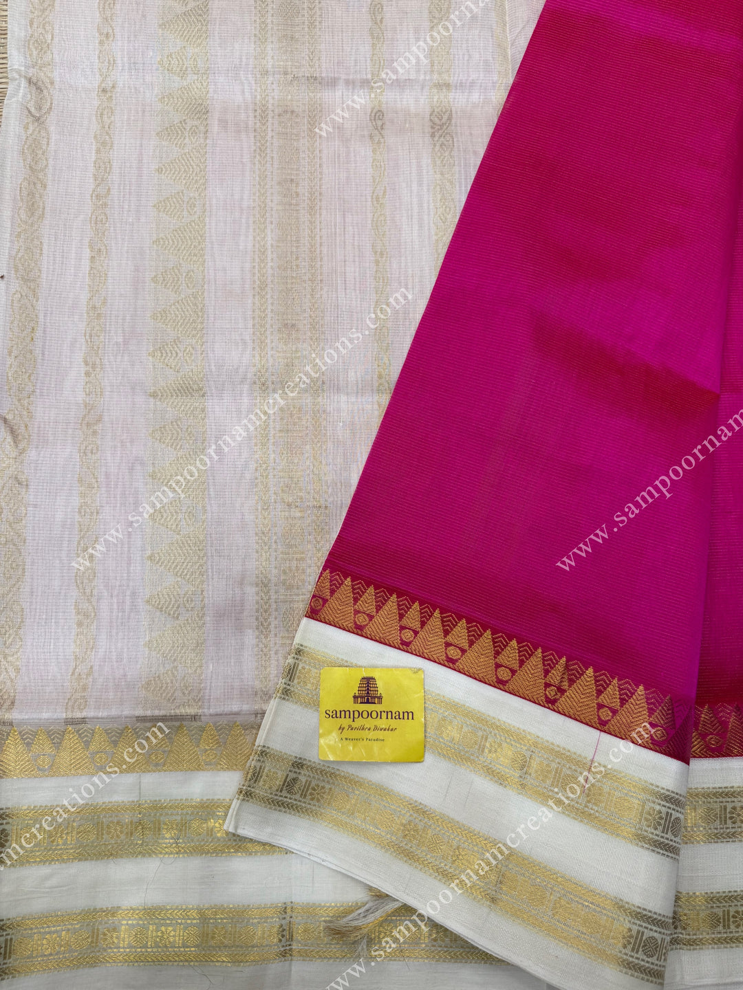 Pink with Offwhite , Vairaoosi Zari lines in the body  and  rettapet borders  , rich Pallu Korvai Silk Cotton Saree