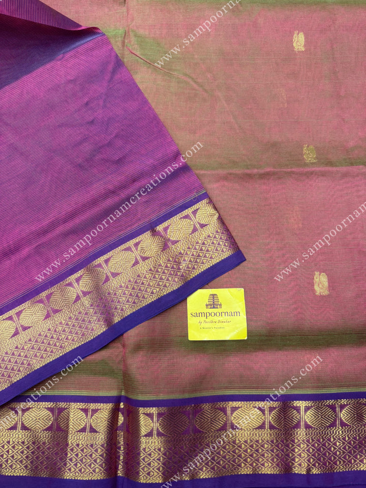 Double Shaded magenta and green , Zari butta in the body with  Vairaoosi Zari lines , traditional borders  and rich Pallu Silk Cotton Saree