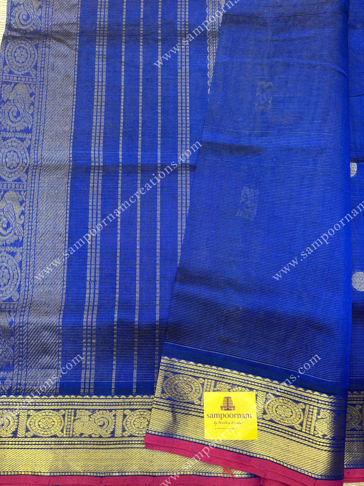 Indigo Blue , Red Selvedge  , Zari butta in the body with  Vairaoosi Zari lines , traditional borders  and rich Pallu Silk Cotton Saree