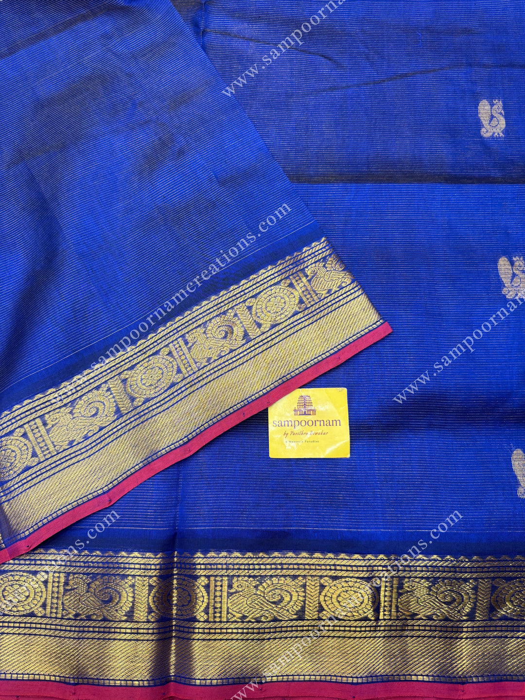 Indigo Blue , Red Selvedge  , Zari butta in the body with  Vairaoosi Zari lines , traditional borders  and rich Pallu Silk Cotton Saree