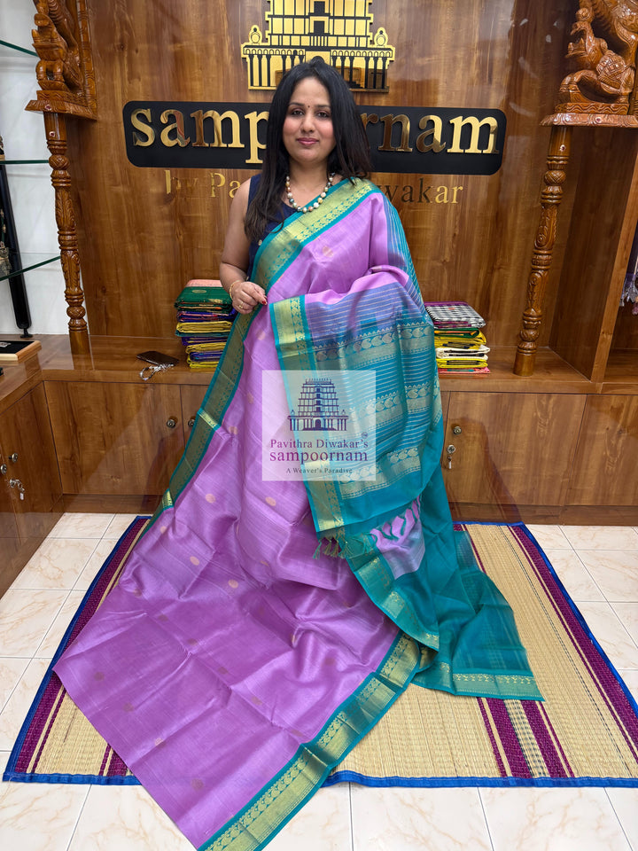 Lavender with Turquoise Blue , traditional border with Rich Zari butta in the body and Grand Pallu Korvai Silk Cotton Saree