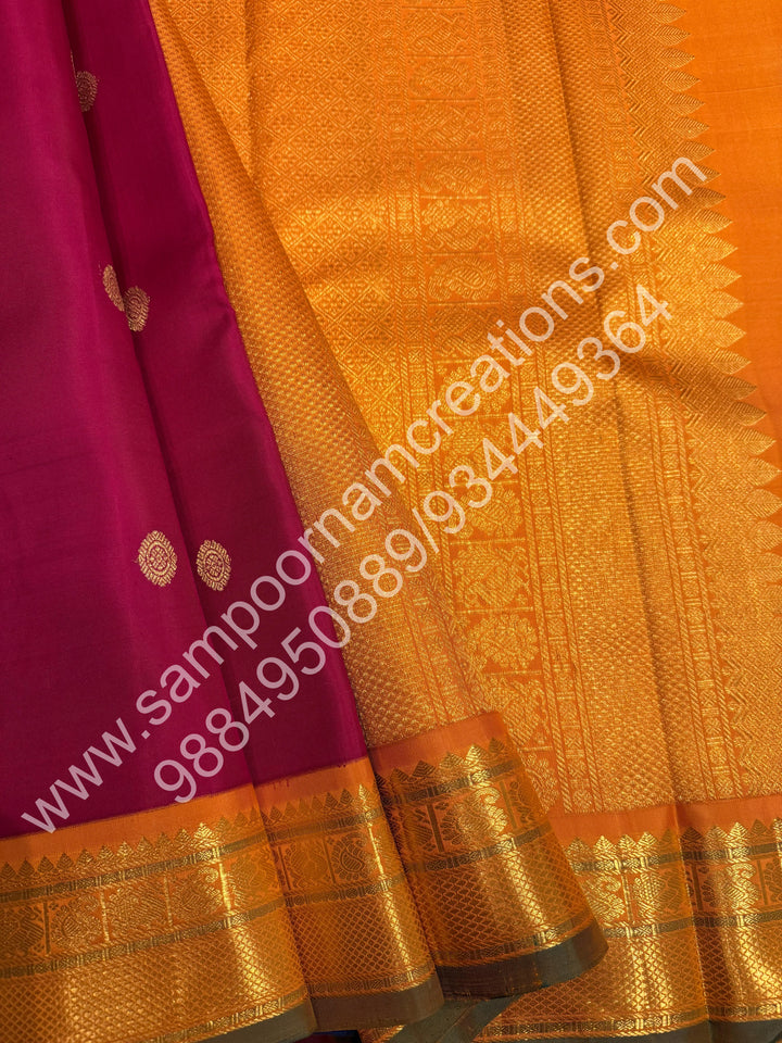 Kumkum Red with Mustard , Rich Mayil and Chakram  butta in the body , Traditional borders and Rich Pallu , Pure Kanjivaram Silk Saree