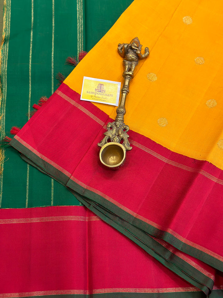 A Must Have Two Pallu Concept Ganga Jamuna Red/Green ,Mambazha Manjal Colour with Chakram Butta Traditional Kanjivaram Pure Silk Saree.Pure Zari Pure Silk