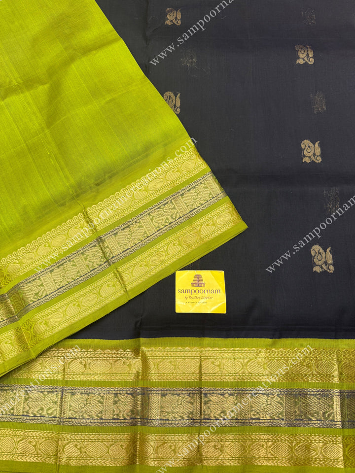 Black with Lemon Green  , Rich Zari butta in the body and Kanchi  borders , grand Pallu Korvai Silk Cotton Saree