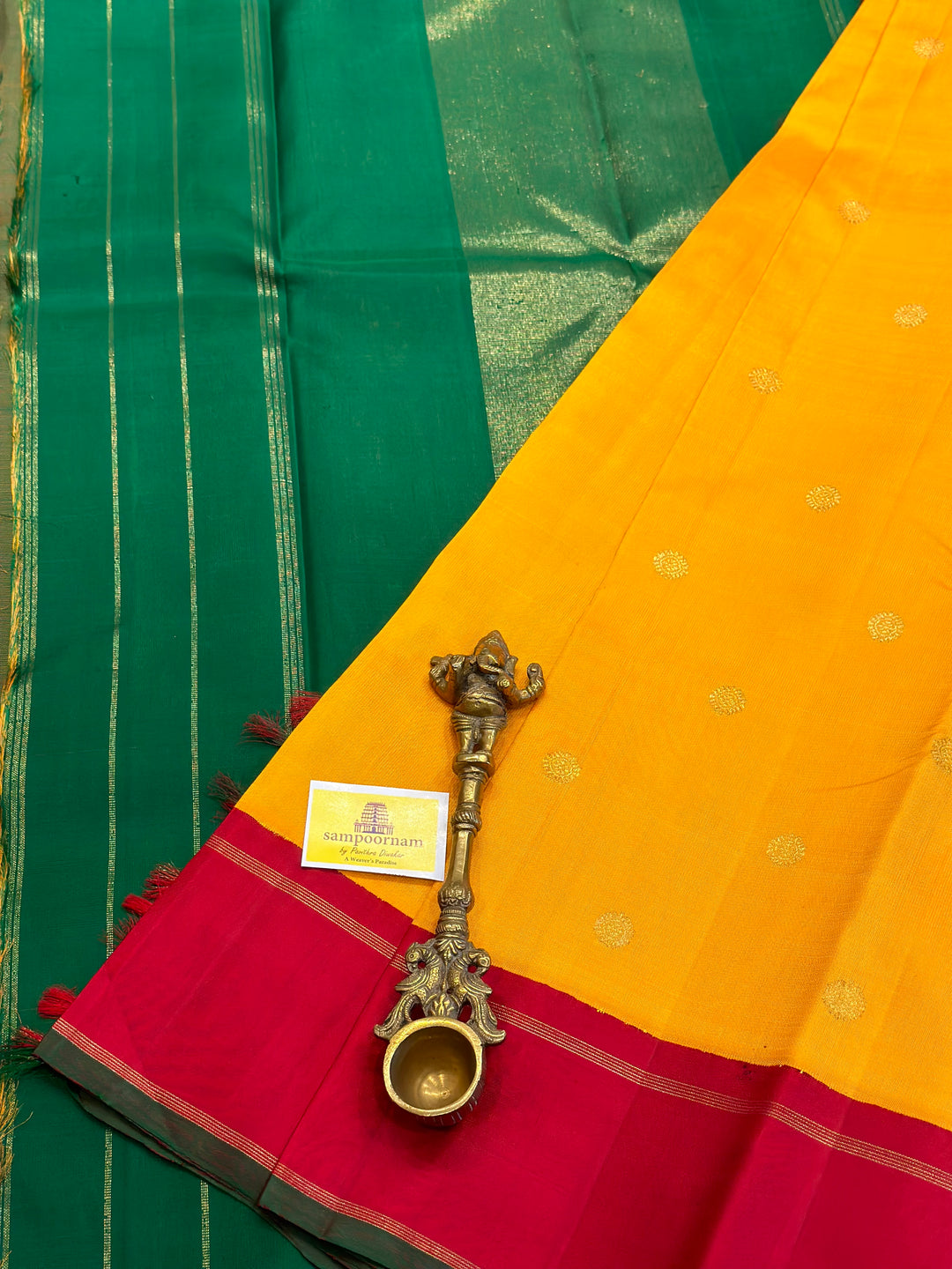 A Must Have Two Pallu Concept Ganga Jamuna Red/Green ,Mambazha Manjal Colour with Chakram Butta Traditional Kanjivaram Pure Silk Saree.Pure Zari Pure Silk