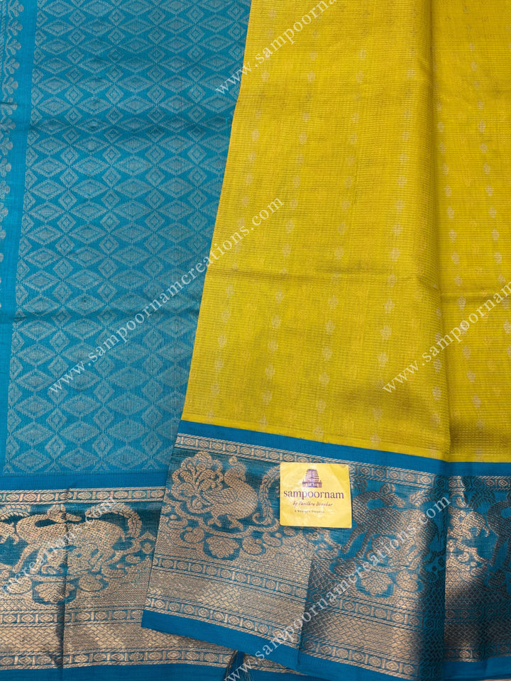 Lemon Yellow with Turquoise Blue ,  Rich Zari butta and Podi Kattam in the body , traditional One side long border , grand Pallu Korvai Silk Cotton Saree