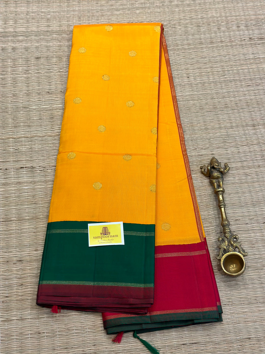 A Must Have Two Pallu Concept Ganga Jamuna Red/Green ,Mambazha Manjal Colour with Chakram Butta Traditional Kanjivaram Pure Silk Saree.Pure Zari Pure Silk