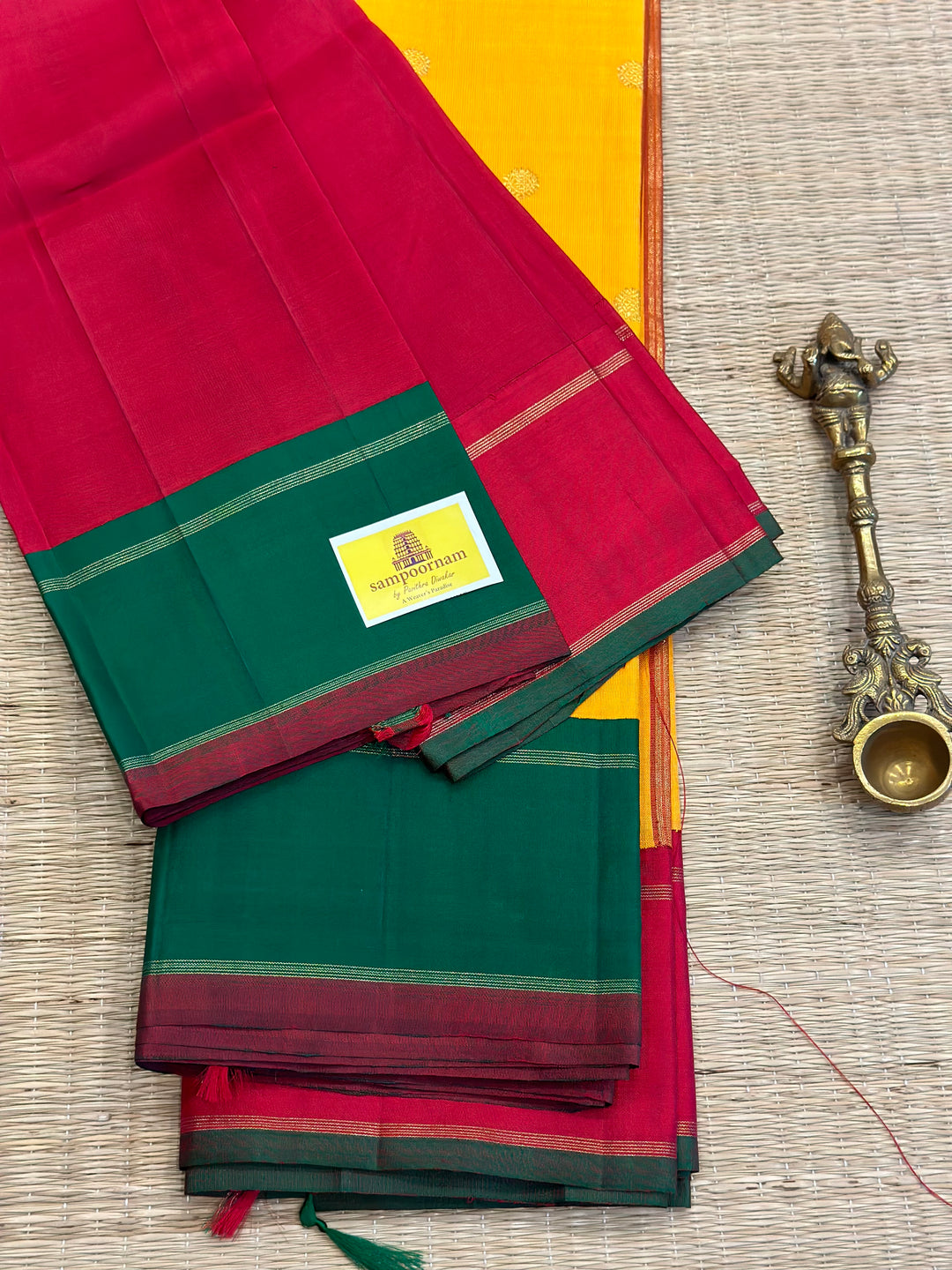 A Must Have Two Pallu Concept Ganga Jamuna Red/Green ,Mambazha Manjal Colour with Chakram Butta Traditional Kanjivaram Pure Silk Saree.Pure Zari Pure Silk